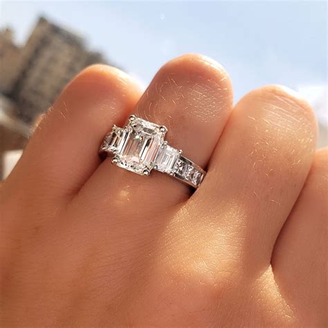 Engagement Ring with an Emerald Cut Diamond and 